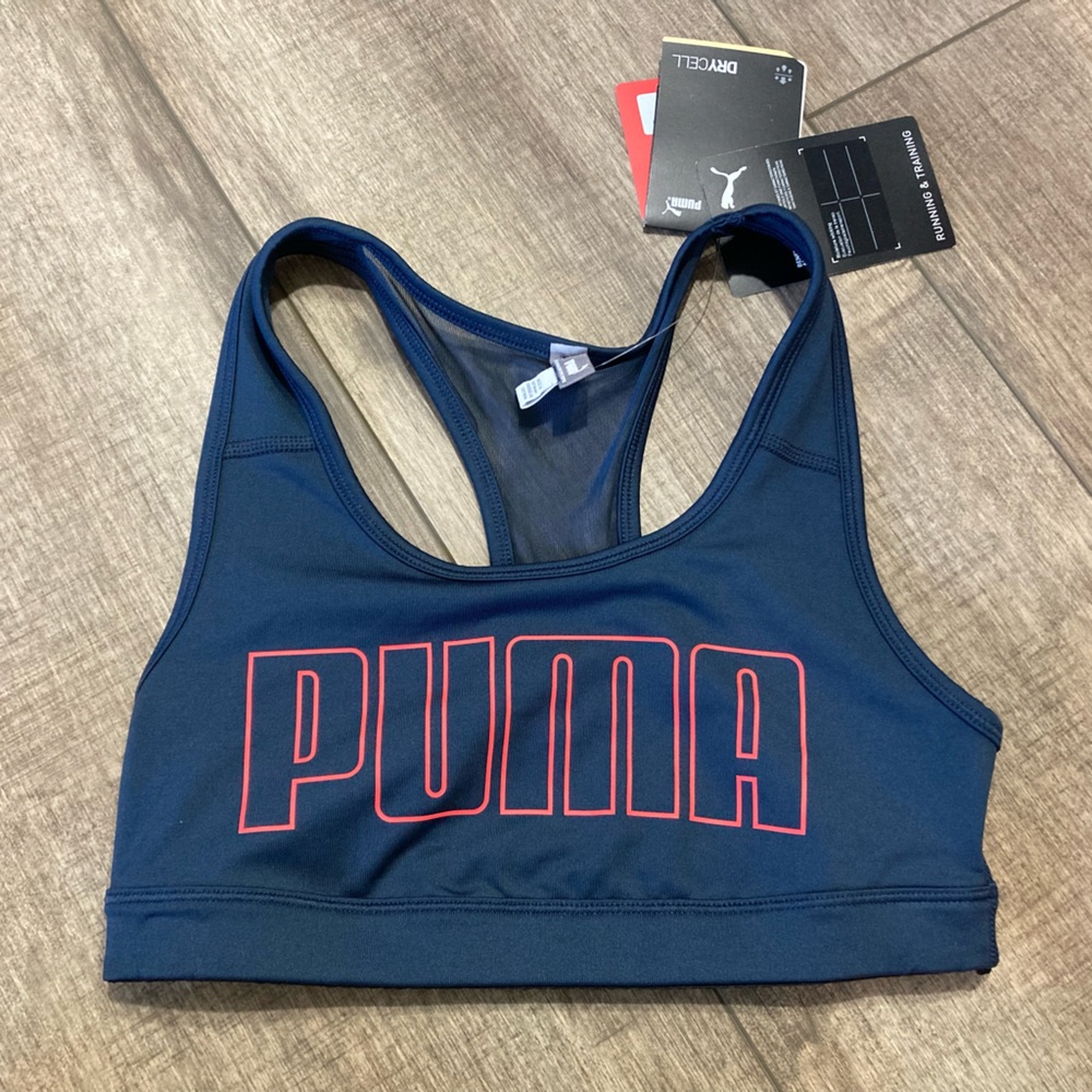 NWT Puma women’s XS mid impact 4 keeps sports bra